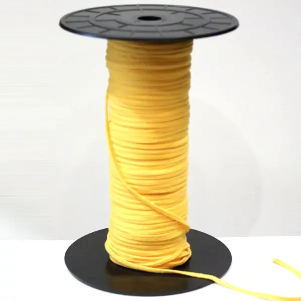 Sanit. Amarilla, Goma sanitaria suave para mascarillas en color amarillo. Ancho 3mm.