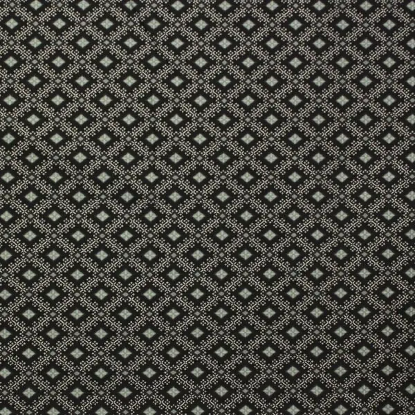 Petal Lace, Tela de Paula Barnes con fondo negro y dibujos geométricos en verde 