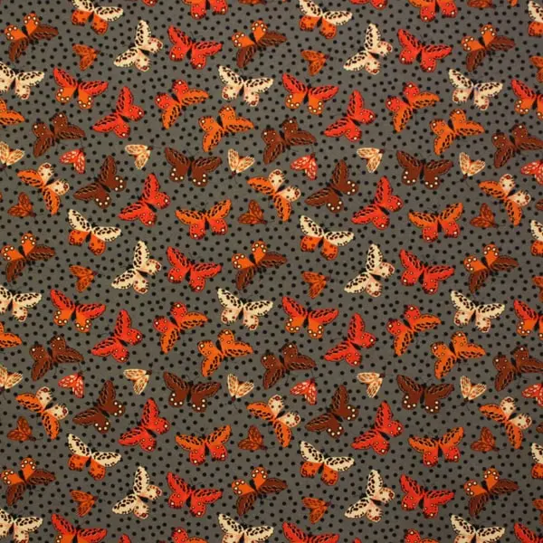 Lulu Mariposas , Fondo gris con topos negros y mariposas en colores tierra